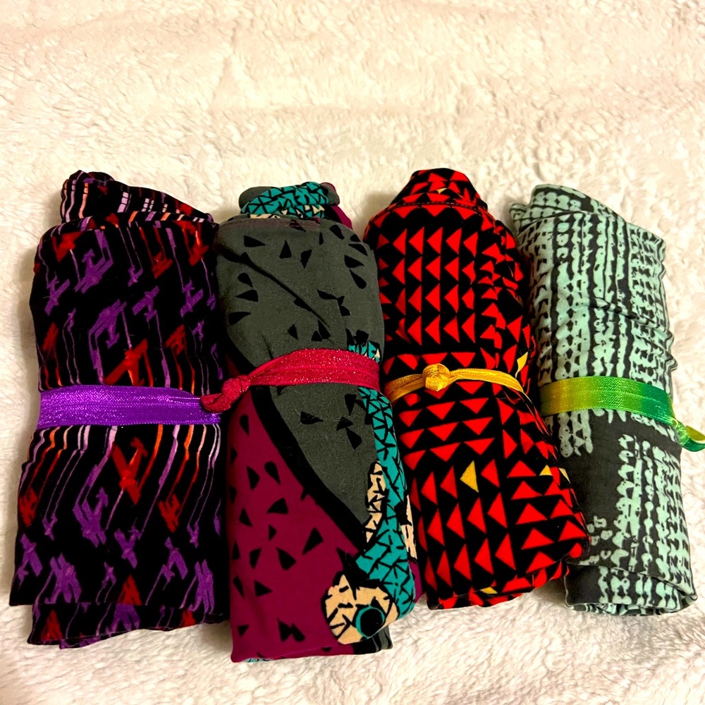 LuLaRoe brand new bundle! Four pairs of OS leggings
